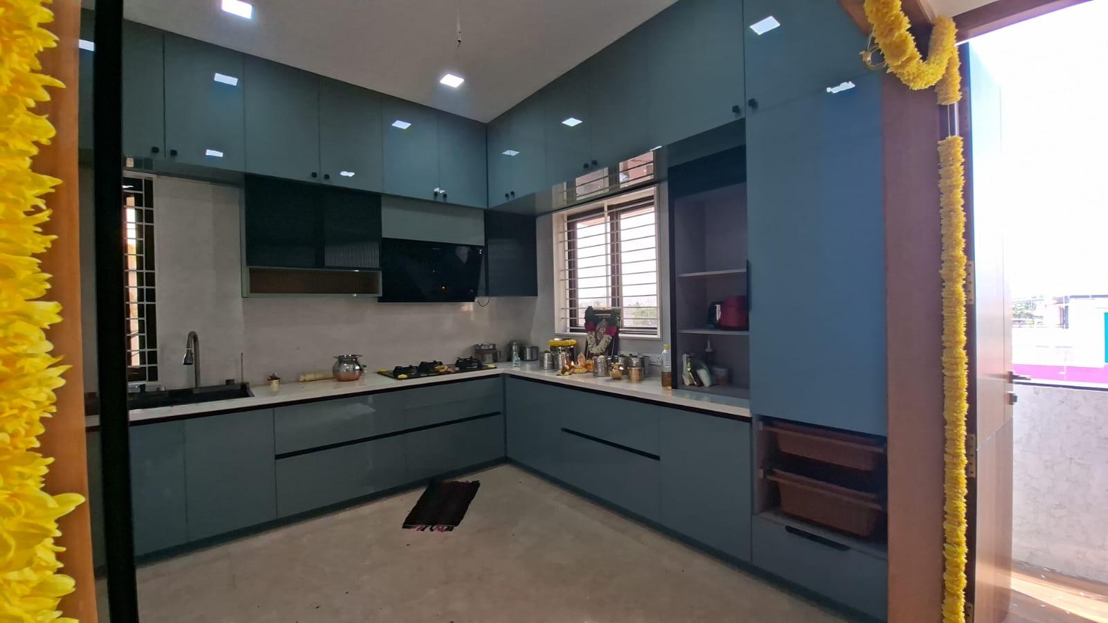 High-Gloss Teal Modular Kitchen Handover Ceremony